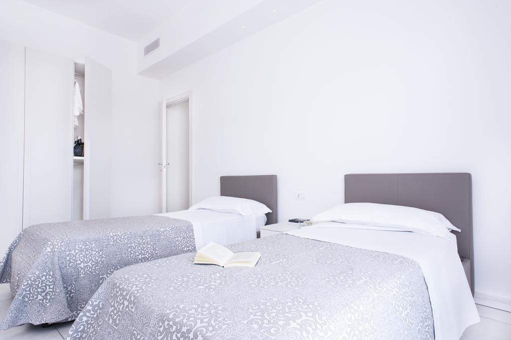 Vuelle Residence Apartments Capo dʼOrlando Zimmer foto